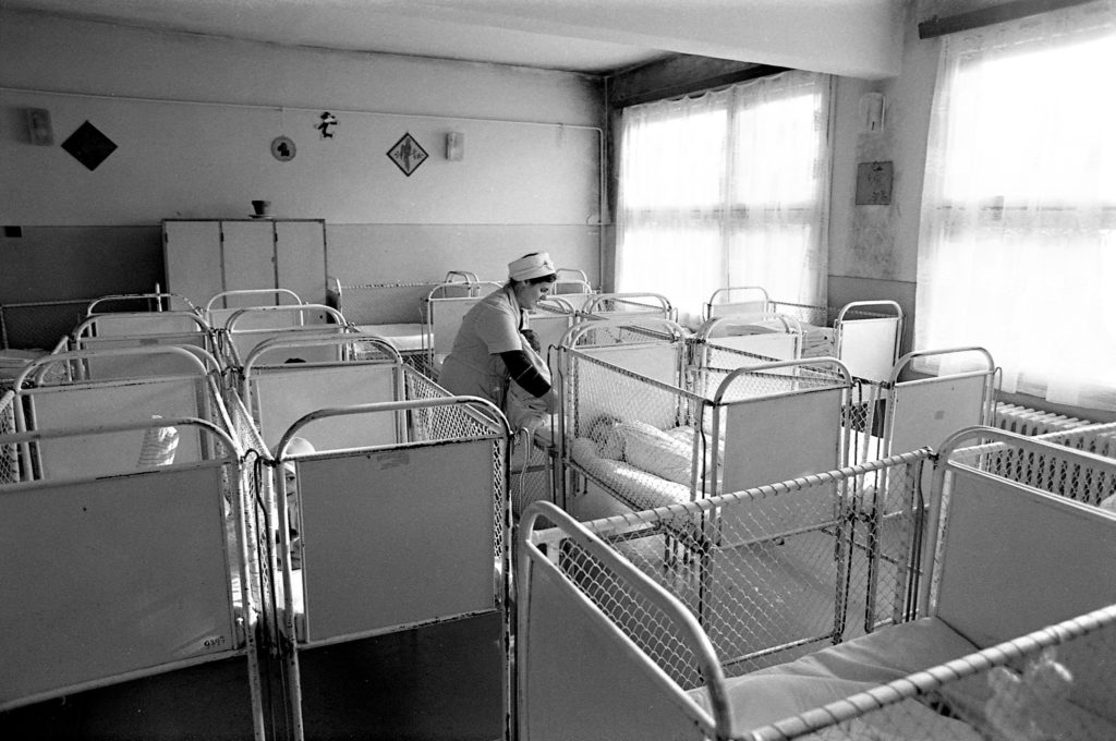 Infants at an orphanage in Bucharest, Romania, were changed and fed but otherwise ignored.Michael Carrol