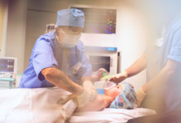 Doctors preparing a patient for an operation