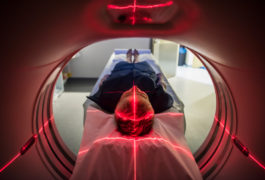 human going through MRI